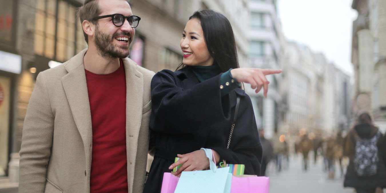Couple Shopping In-Store and Online